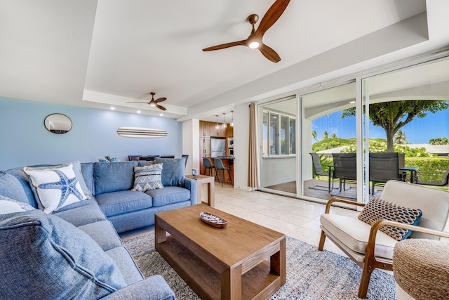 3200 Wailea Alanui Dr Unit 2105, Kihei, HI 96753 - living area featuring ceiling fan, light tile patterned floors, and a raised ceiling