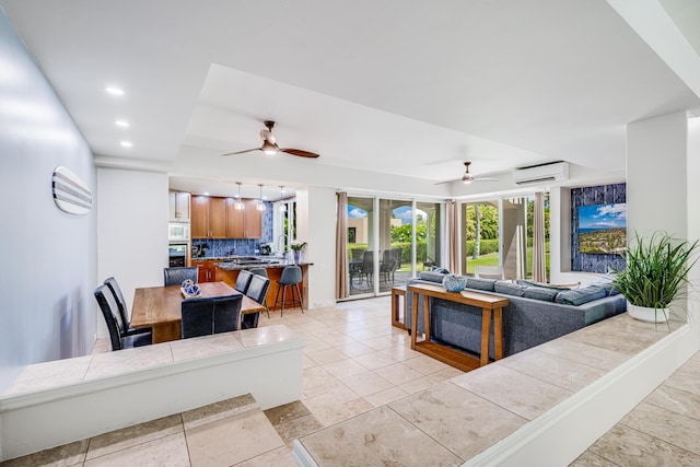 3200 Wailea Alanui Dr Unit 2105, Kihei, HI 96753 - living room with a wall mounted air conditioner, a ceiling fan, and recessed lighting