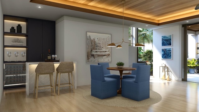 dining room with bar area, light hardwood / wood-style floors, expansive windows, and wooden ceiling