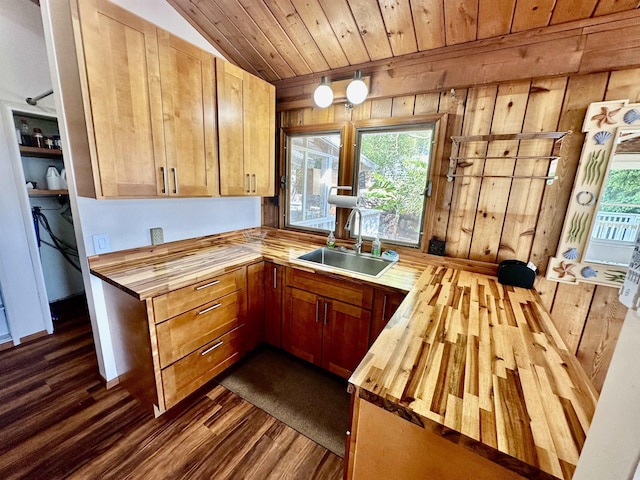 interior space with light carpet and wood walls