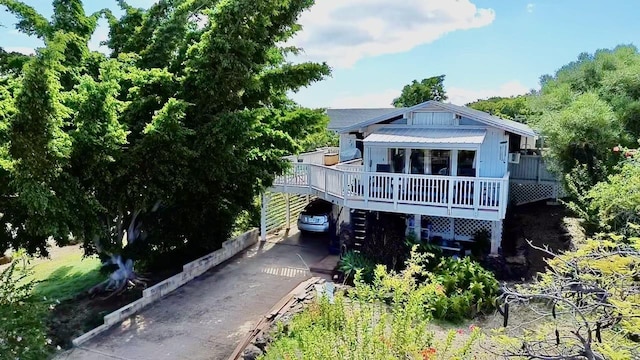 view of front of house featuring a carport