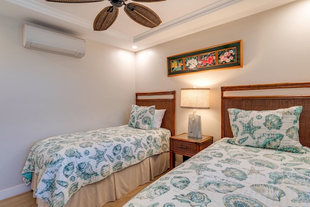 bedroom featuring light hardwood / wood-style flooring, a wall unit AC, ceiling fan, and crown molding