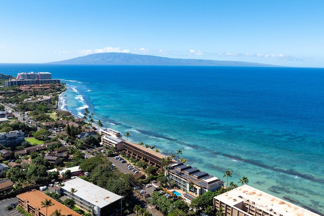 aerial view with a beach view and a water and mountain view