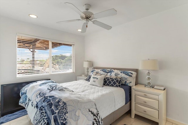 tiled bedroom with ceiling fan