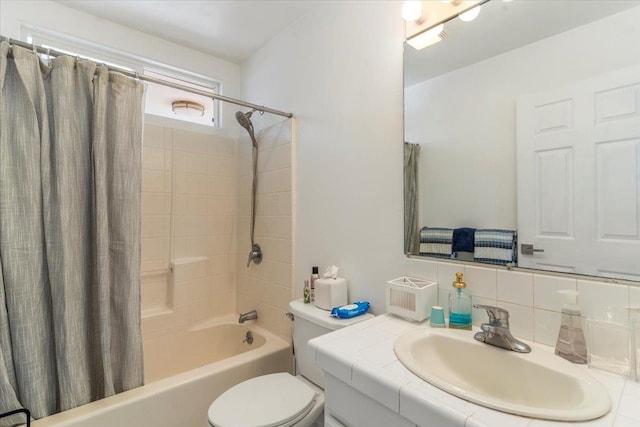 full bathroom with shower / bath combination with curtain, vanity, toilet, and tasteful backsplash