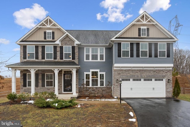 craftsman inspired home featuring a garage