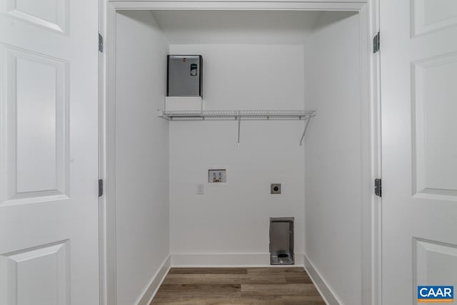 laundry area featuring electric dryer hookup, hardwood / wood-style floors, and washer hookup