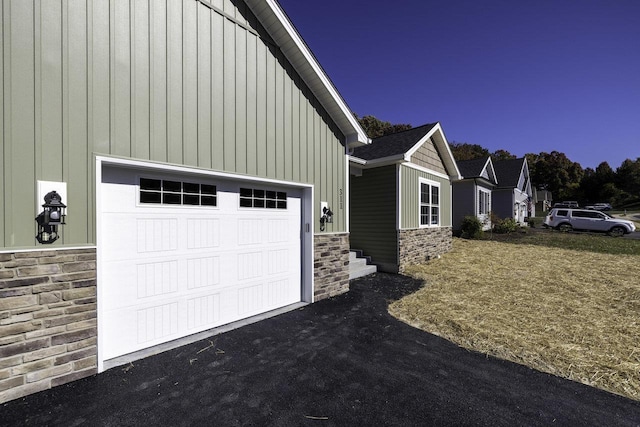 view of property exterior featuring a garage