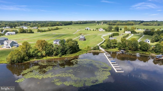 bird's eye view with a water view and a rural view