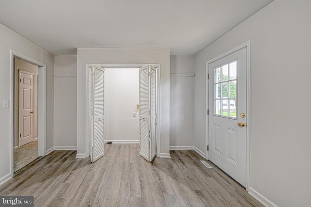 foyer featuring light wood-type flooring