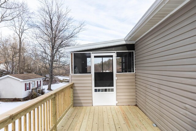 view of snow covered deck