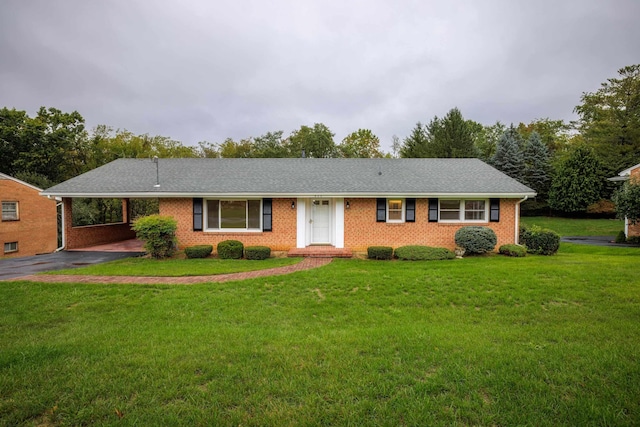 ranch-style house with a front lawn