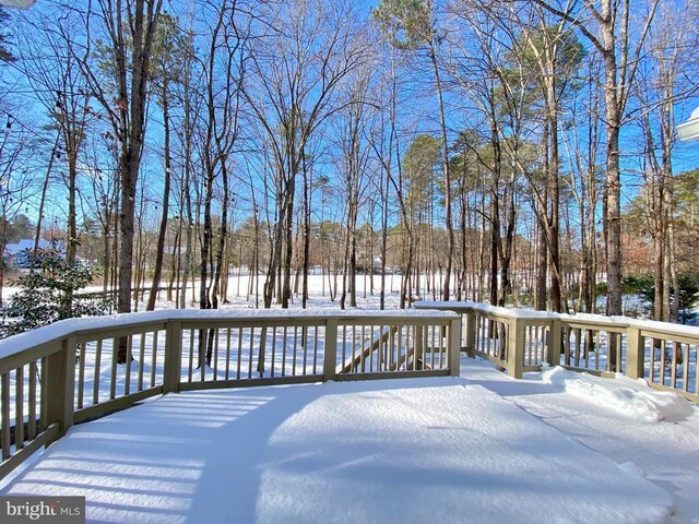 back of house with a wooden deck, a yard, a patio area, and an outdoor living space with a fire pit