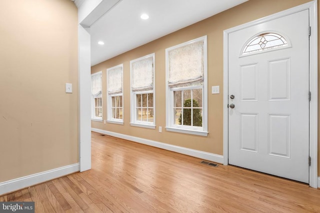 entrance foyer with light wood-type flooring