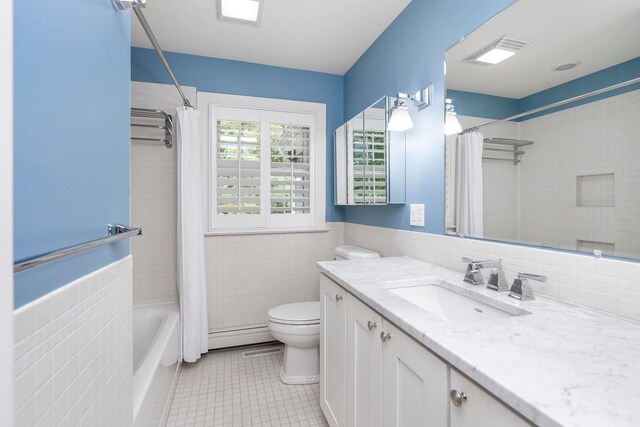 full bathroom featuring tile walls, tile patterned floors, toilet, and shower / tub combo with curtain