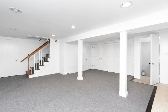 basement with carpet flooring