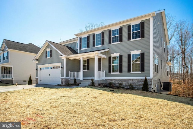 view of front of property featuring a porch, concrete driveway, central AC, and a front lawn