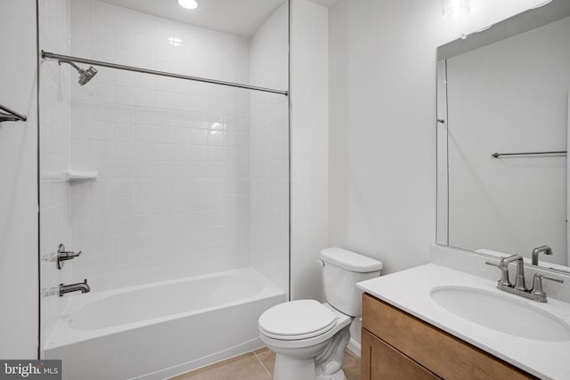 full bathroom featuring toilet, tile patterned flooring, bathtub / shower combination, and vanity