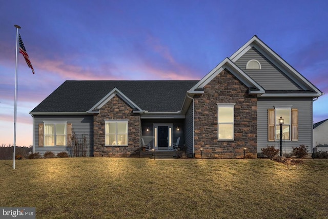 craftsman-style house with a lawn