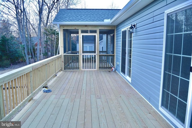 wooden terrace with a sunroom