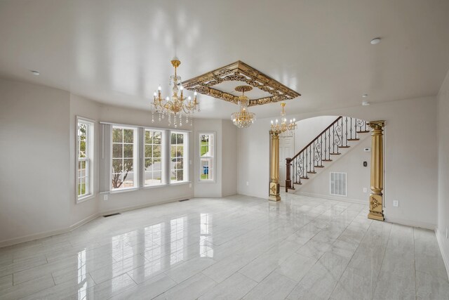 unfurnished living room featuring an inviting chandelier