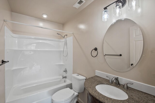 full bathroom with shower / tub combination, vanity, and toilet