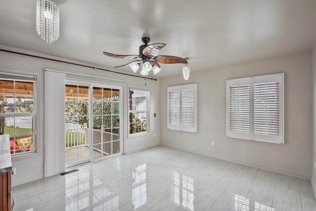 unfurnished room featuring ceiling fan