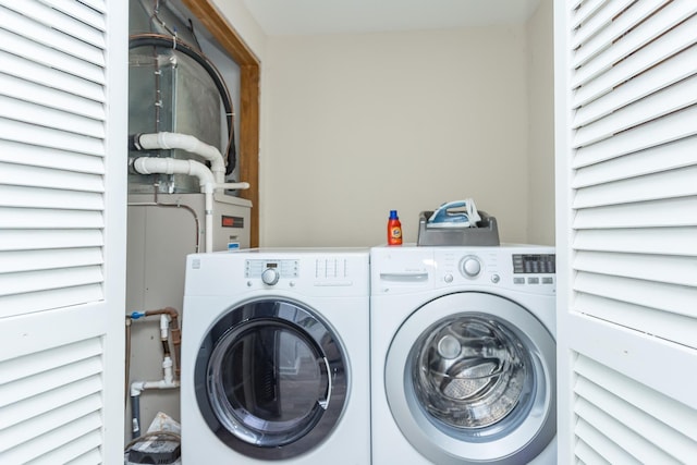 laundry area with laundry area and separate washer and dryer