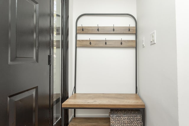 mudroom with wood finished floors