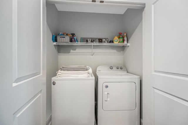 laundry room featuring laundry area and washer and clothes dryer