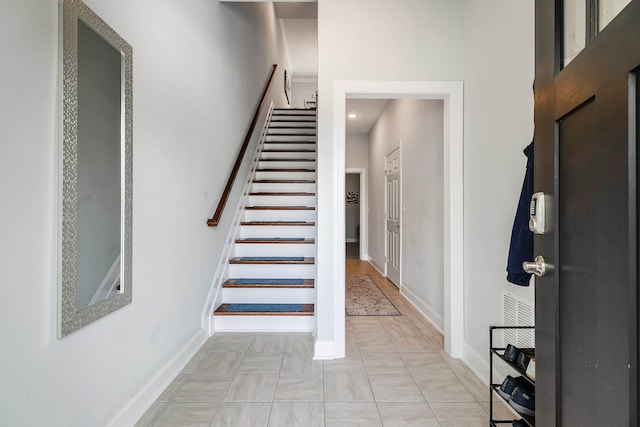 staircase with baseboards