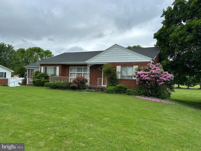 view of front of home with a front yard