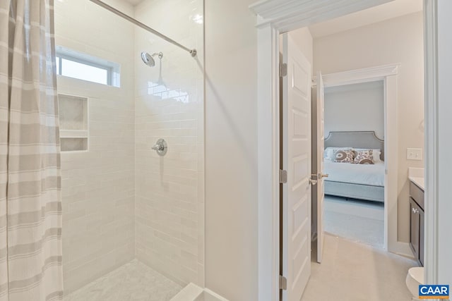 full bathroom featuring a stall shower, ensuite bath, and vanity