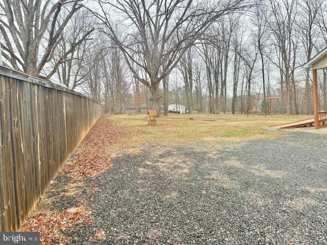 view of yard featuring fence