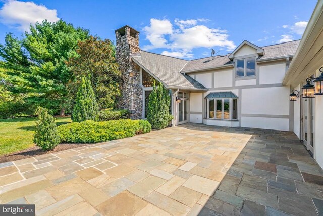 view of front of home featuring a patio area