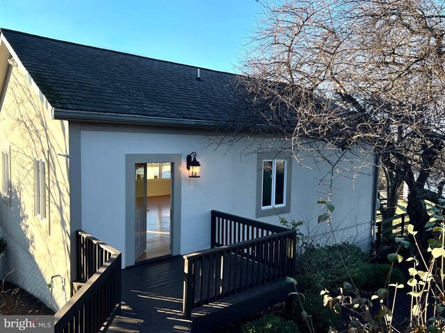 exterior space featuring a wooden deck