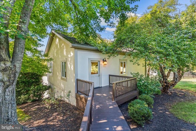 view of front of property featuring a deck