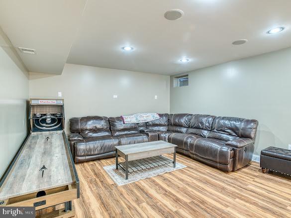 living room with light hardwood / wood-style floors