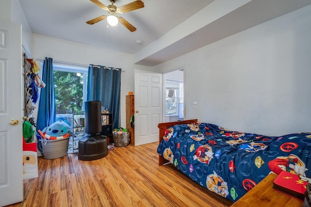 bedroom featuring ceiling fan and wood-type flooring