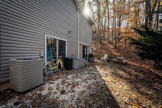 view of home's exterior featuring central air condition unit