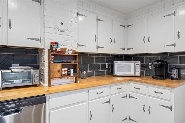 kitchen featuring dishwasher, light countertops, white microwave, and white cabinets