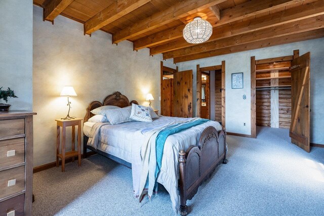 bedroom featuring wood ceiling, beamed ceiling, and carpet flooring