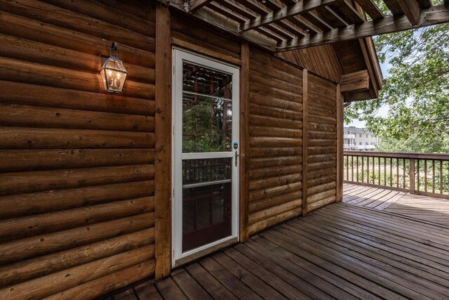 wooden deck featuring a pergola