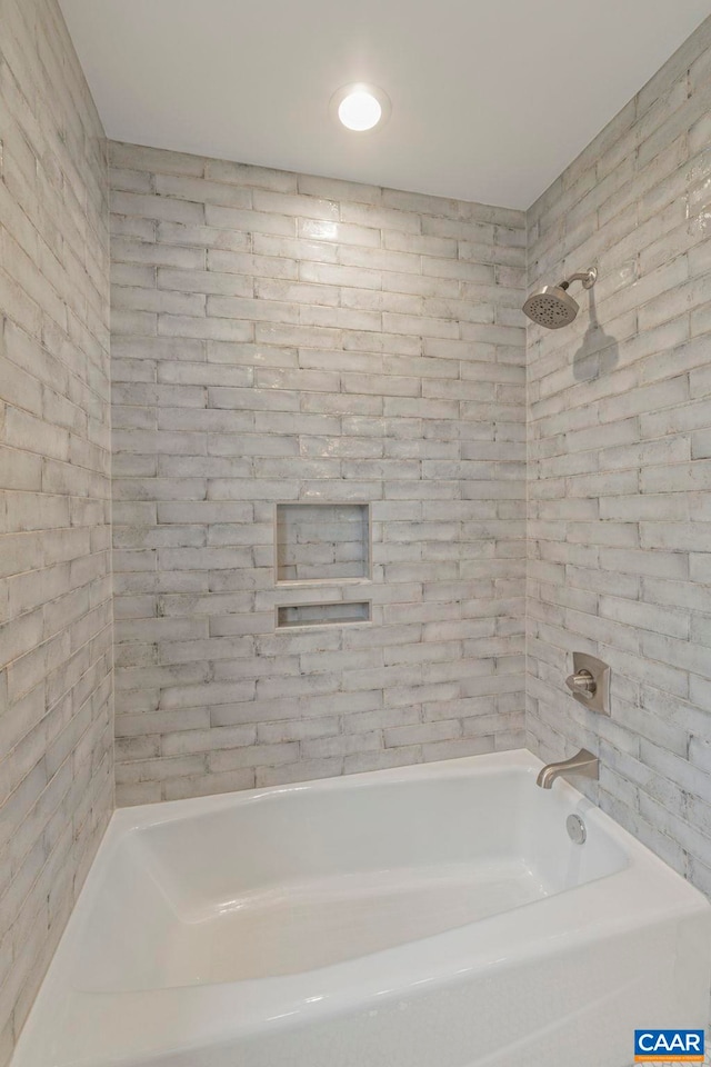 full bath featuring shower / tub combination