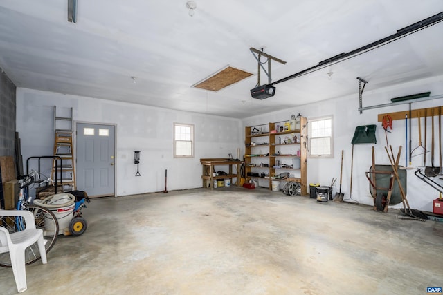 garage featuring a garage door opener