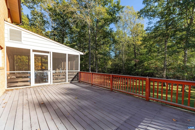 deck featuring a sunroom