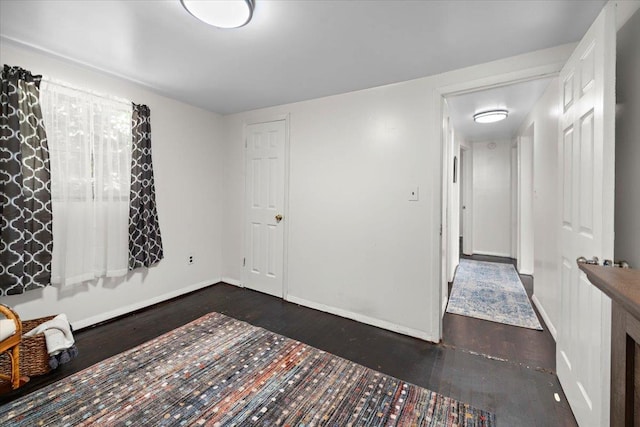 interior space with dark hardwood / wood-style flooring