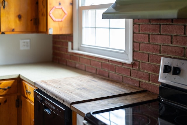 kitchen with brown cabinetry, electric stove, dishwasher, light countertops, and exhaust hood