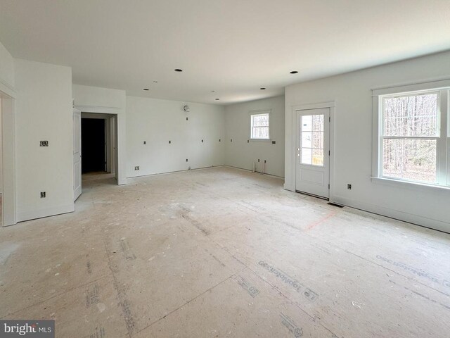 kitchen with stainless steel appliances, sink, white cabinets, and dark hardwood / wood-style floors