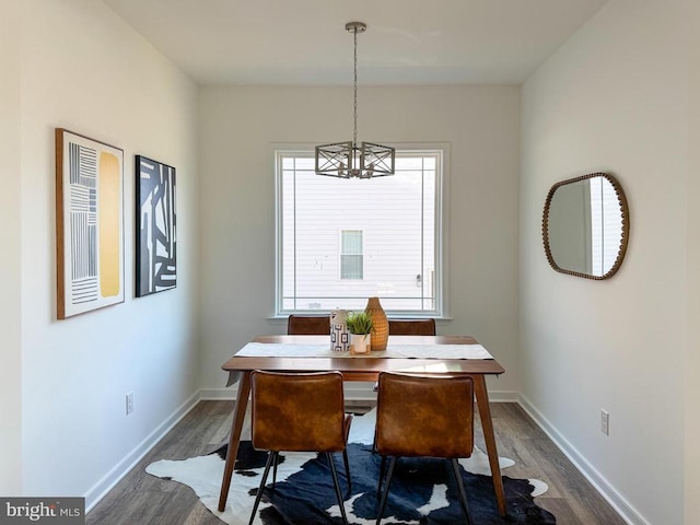 dining room with dark hardwood / wood-style floors